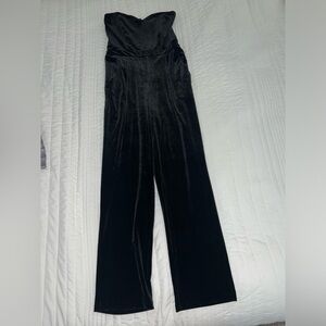 Velvet black jumpsuit from Express. Worn once. Pockets and gold zipper.